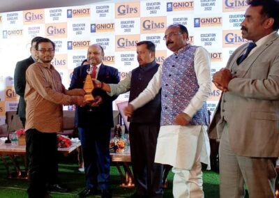 Er. Sunny Singh Chairman of Career Maker receiving award by Nitin Nabin ( National president of the Bharatiya Janata Party )